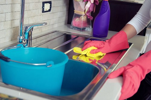 Kitchen cleaning tasks in a SW9 home